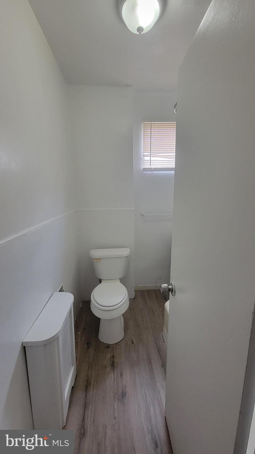3208 D Street Philadelphia, PA 19134 - Photo 26 of 33 a white toilet sitting next to a small bathroom