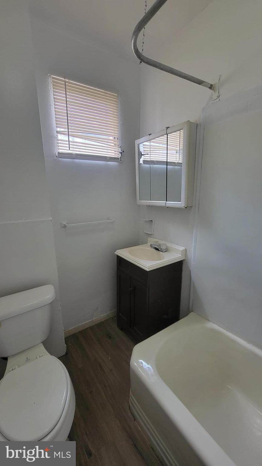 3208 D Street Philadelphia, PA 19134 - Photo 27 of 33 a bathroom with a sink toilet and mirror