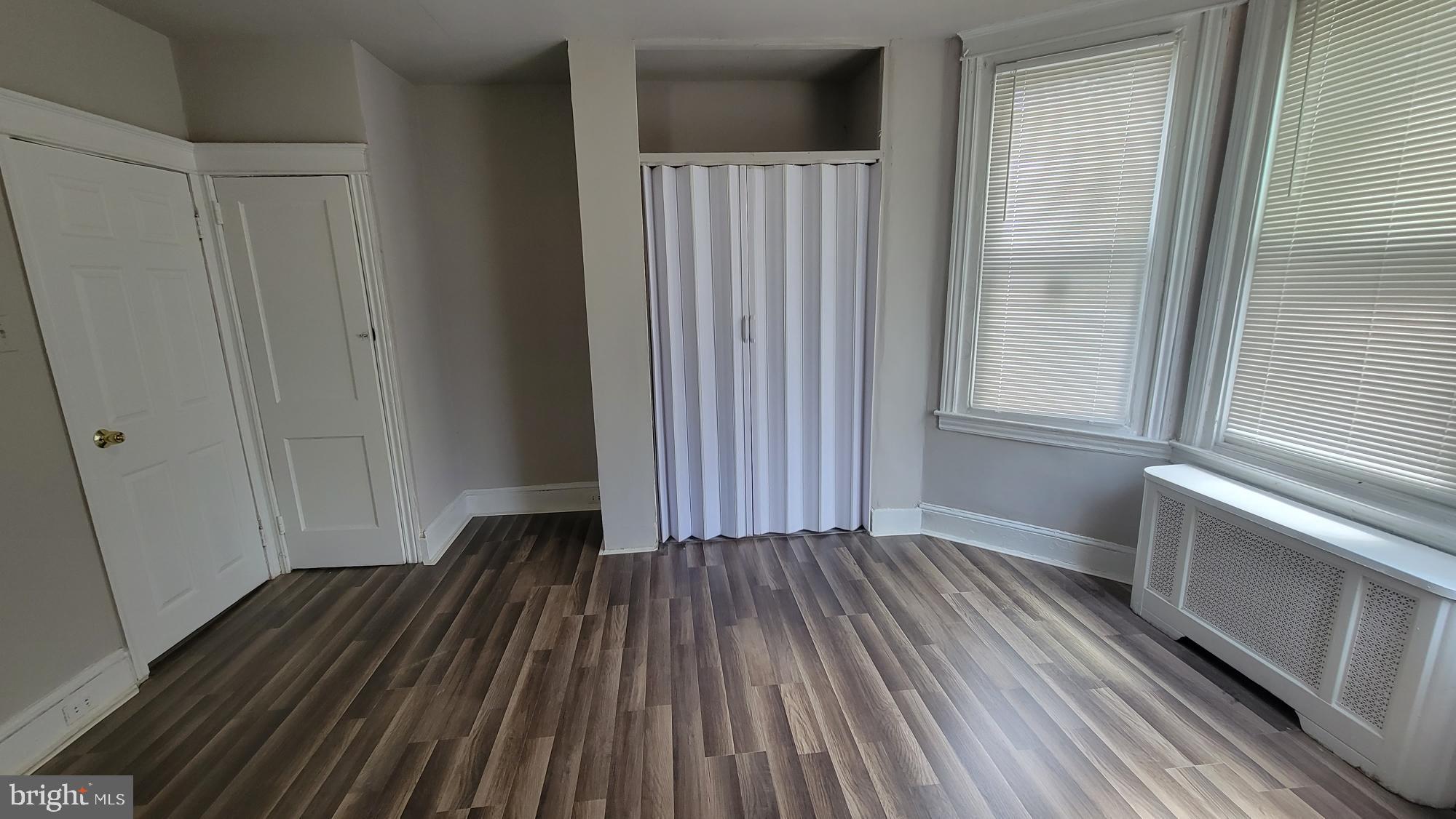 3208 D Street Philadelphia, PA 19134 - Photo 30 of 33 a view of a room with wooden floor and staircase