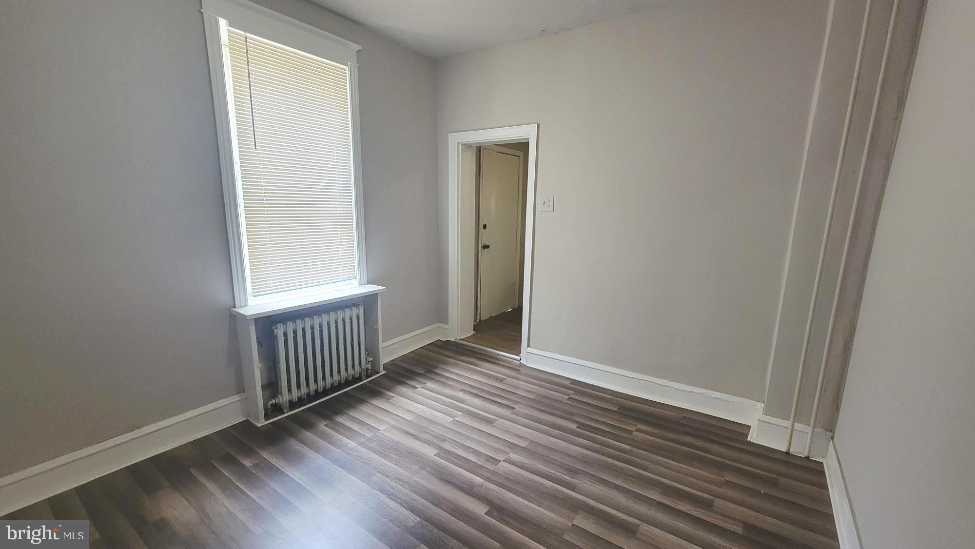 3208 D Street Philadelphia, PA 19134 - Photo 9 of 33 a view of a room with wooden floor and windows
