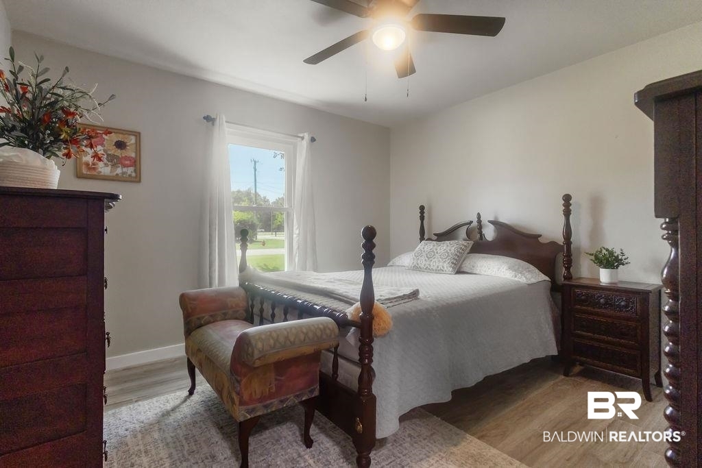 601 East Gate Circle Foley, AL 36535 - Photo 7 of 26 Bedroom with ceiling fan and light hardwood / wood-style floors