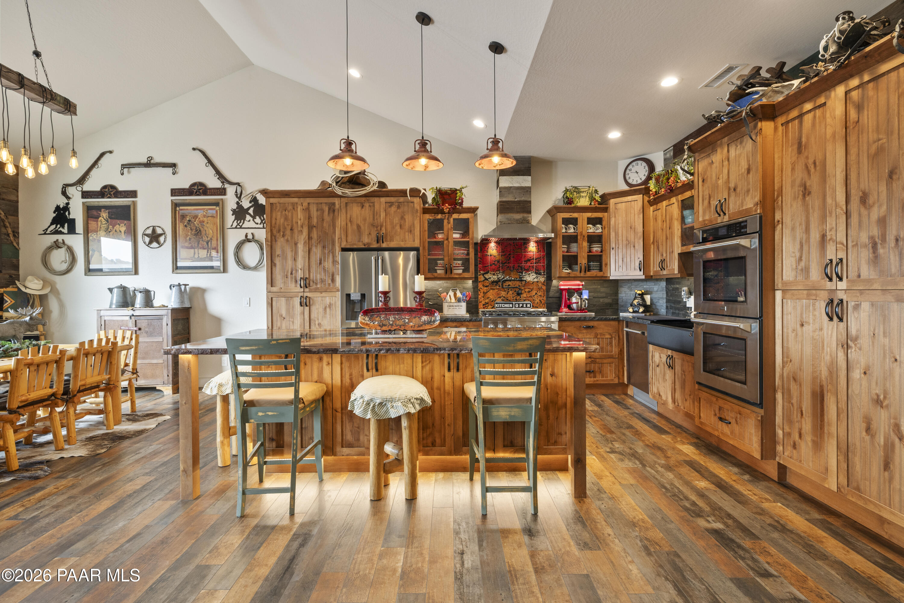 1399 East Western Way Paulden, AZ 86334 - Photo 12 of 44 a view of a dining room with furniture and wooden floor