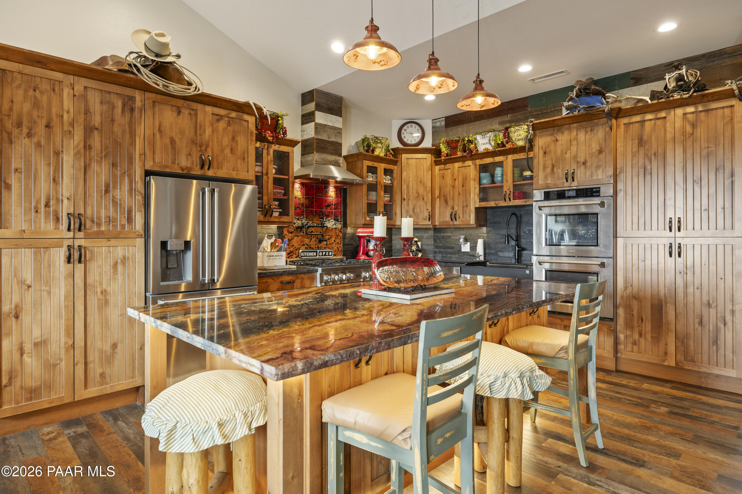 1399 East Western Way Paulden, AZ 86334 - Photo 13 of 44 a view of a dining room with furniture and chandelier