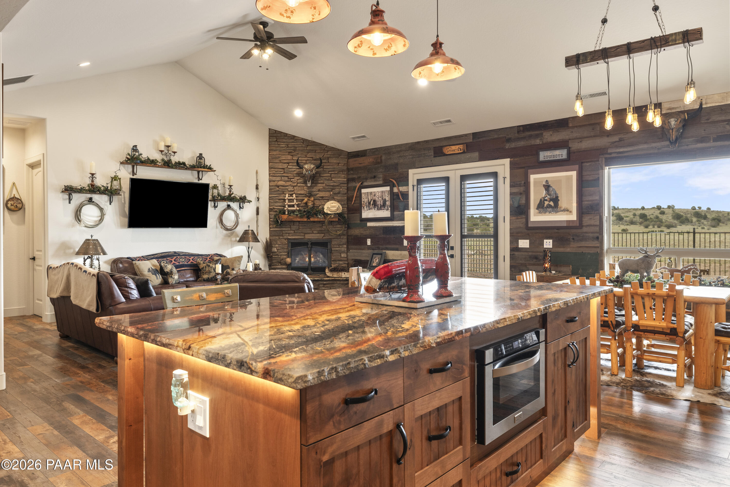 1399 East Western Way Paulden, AZ 86334 - Photo 14 of 44 a kitchen with stainless steel appliances granite countertop a stove and cabinets