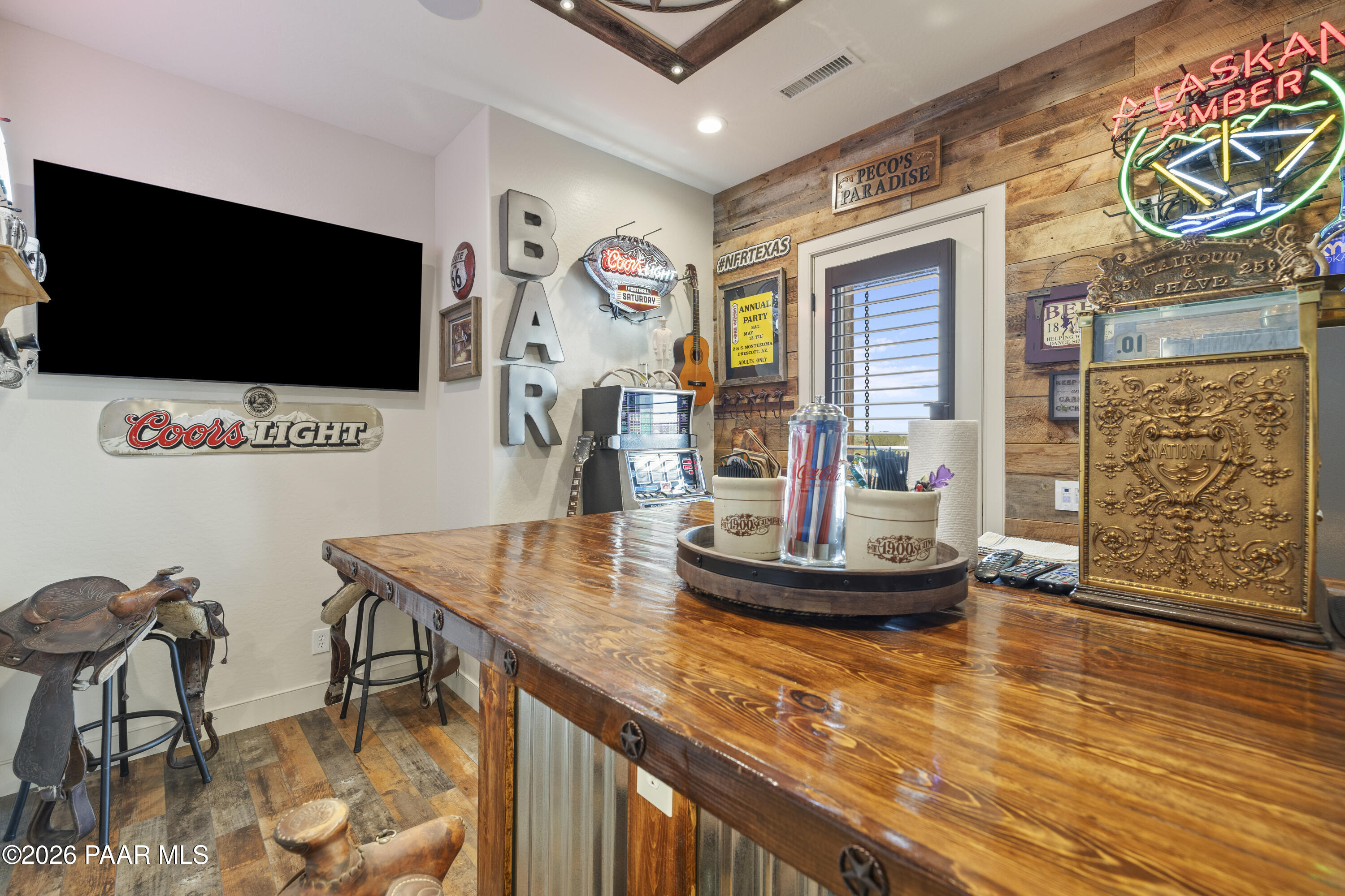 1399 East Western Way Paulden, AZ 86334 - Photo 18 of 44 a living room with furniture and a flat screen tv