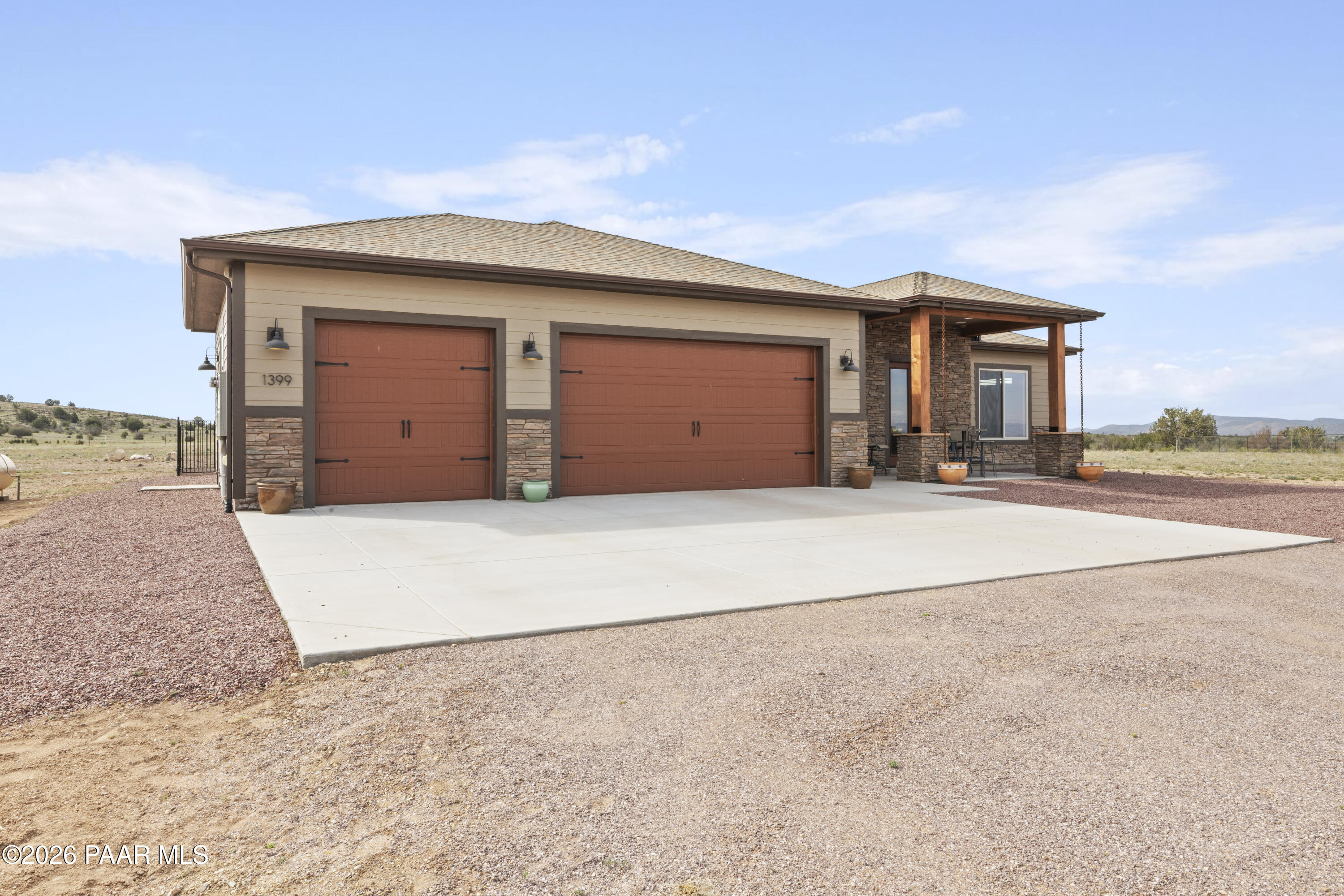 1399 East Western Way Paulden, AZ 86334 - Photo 2 of 44 a front view of a house with a yard