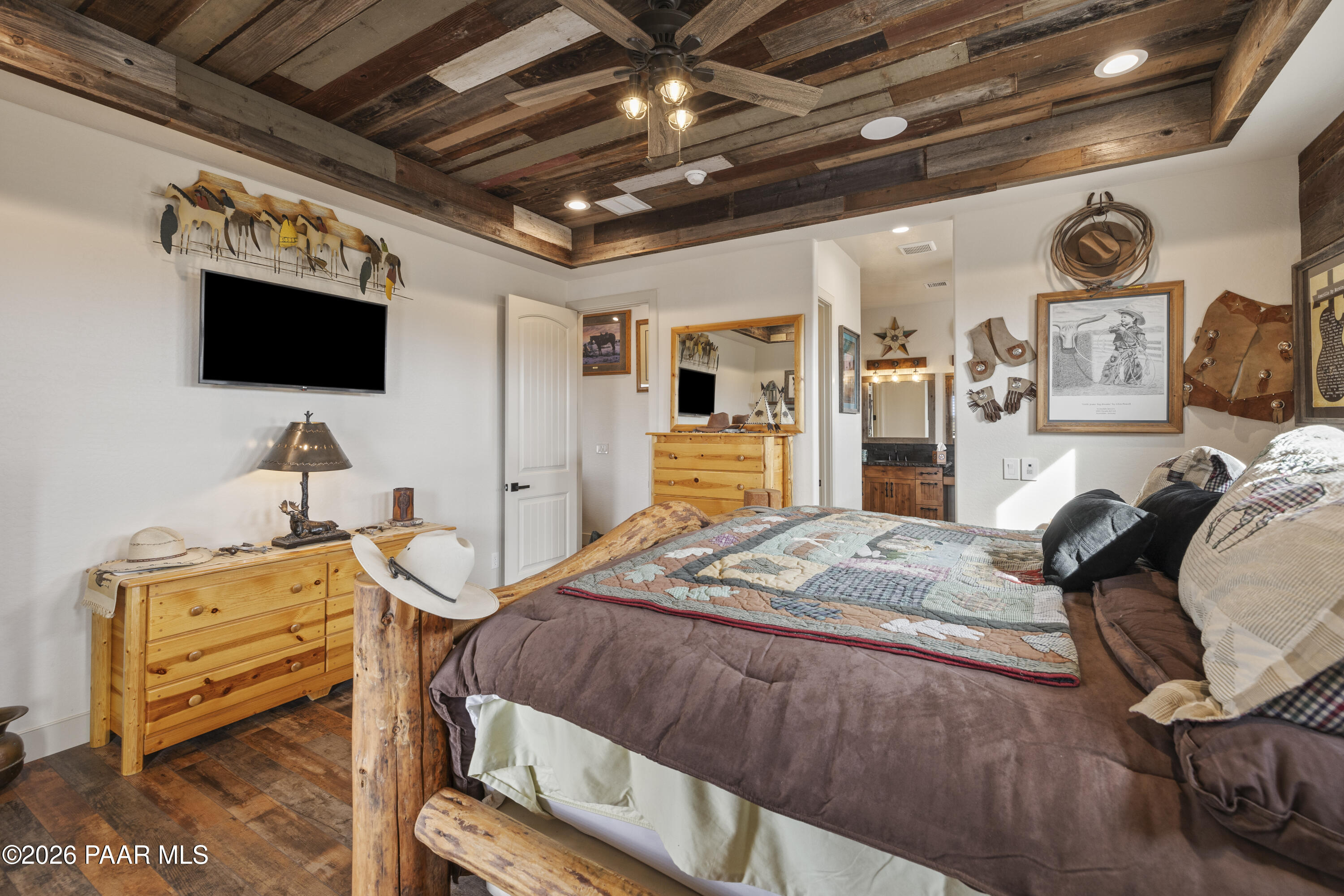 1399 East Western Way Paulden, AZ 86334 - Photo 22 of 44 a bedroom with a bed and a television