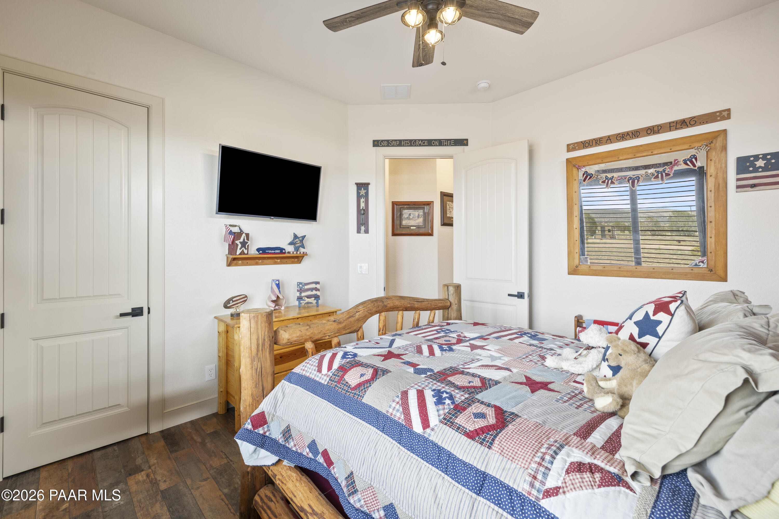 1399 East Western Way Paulden, AZ 86334 - Photo 26 of 44 a bedroom that has a bed and a flat screen tv