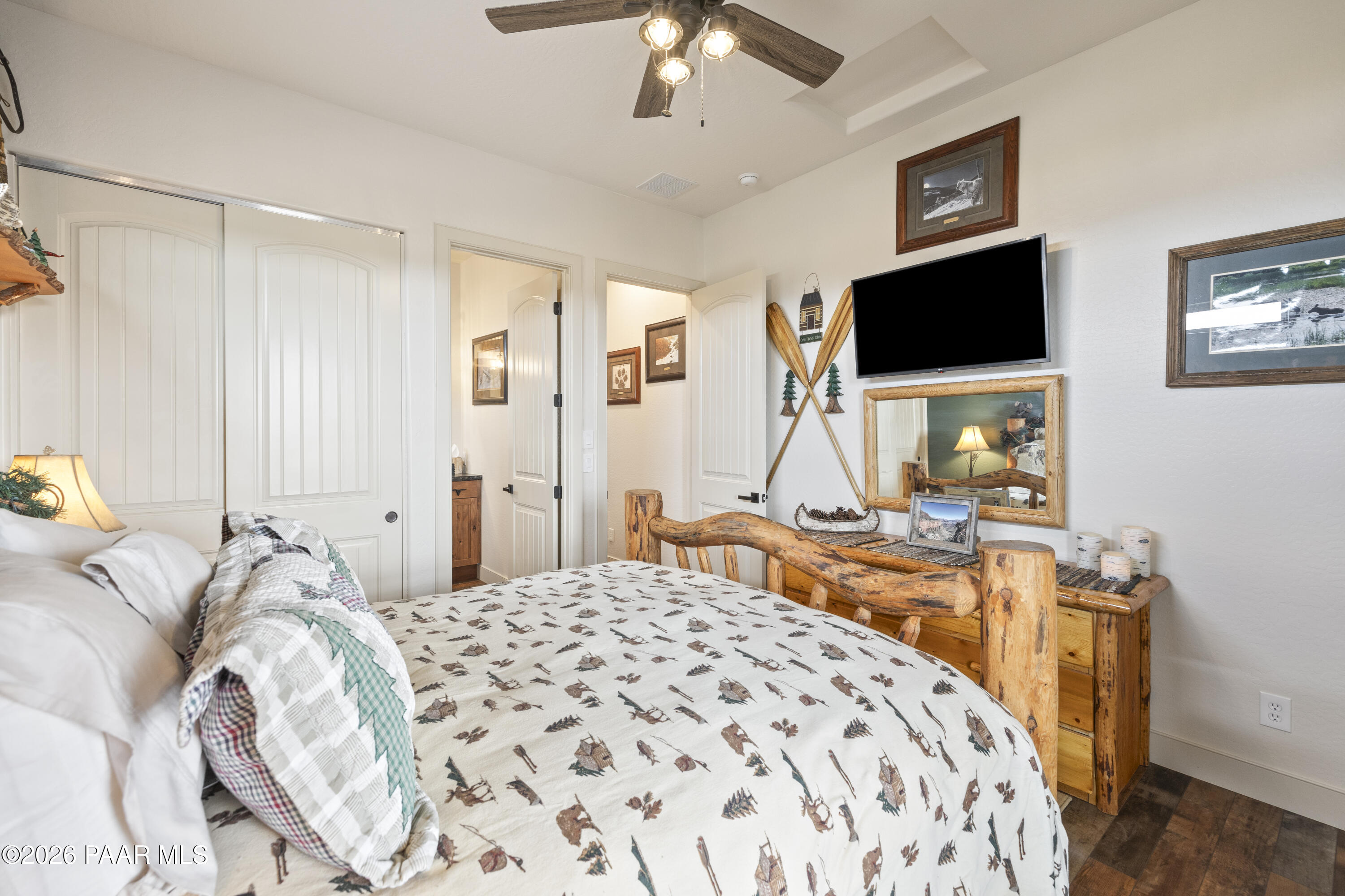 1399 East Western Way Paulden, AZ 86334 - Photo 29 of 44 a bedroom with a bed and a flat screen tv