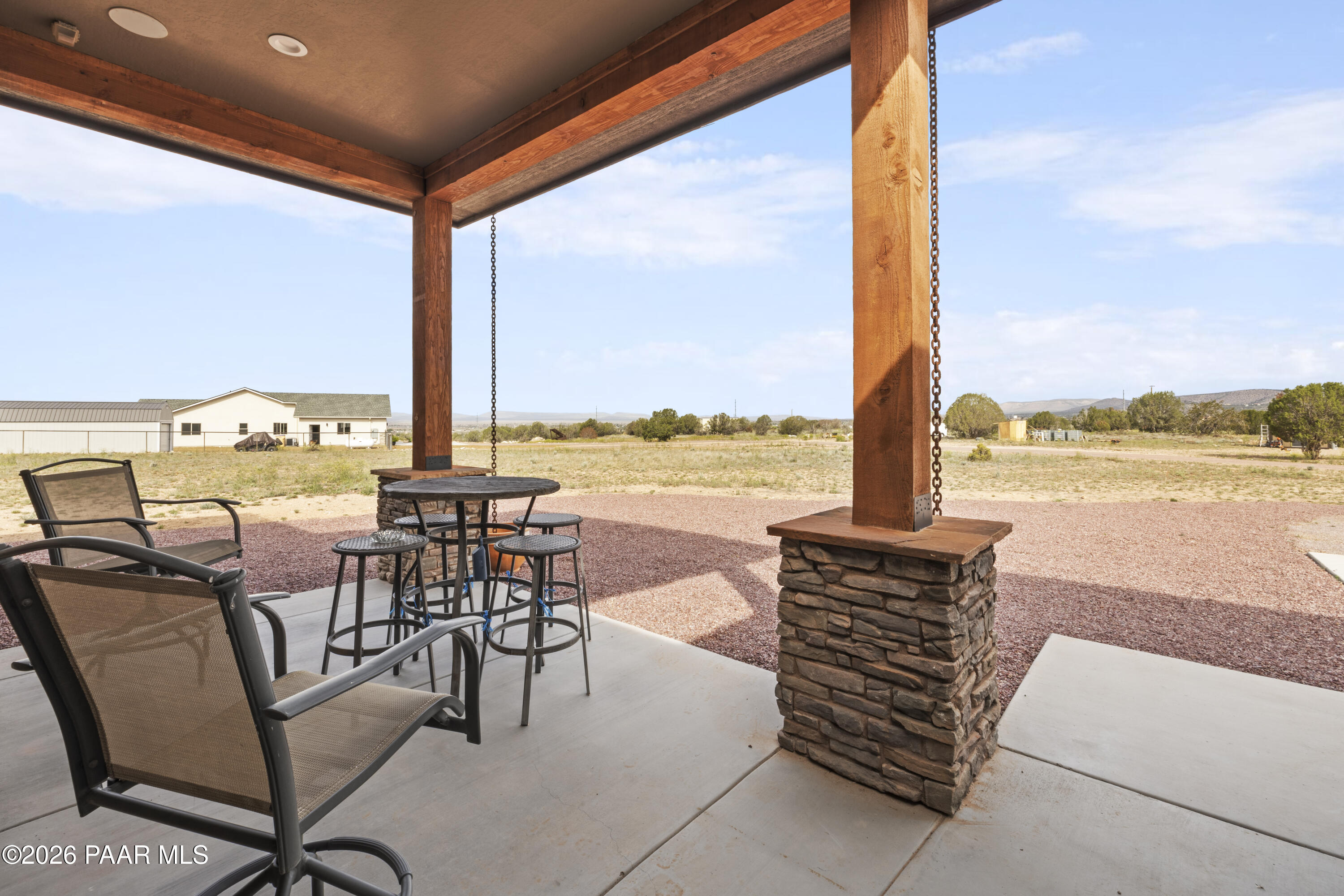 1399 East Western Way Paulden, AZ 86334 - Photo 4 of 44 a building outdoor space with patio furniture and ocean view