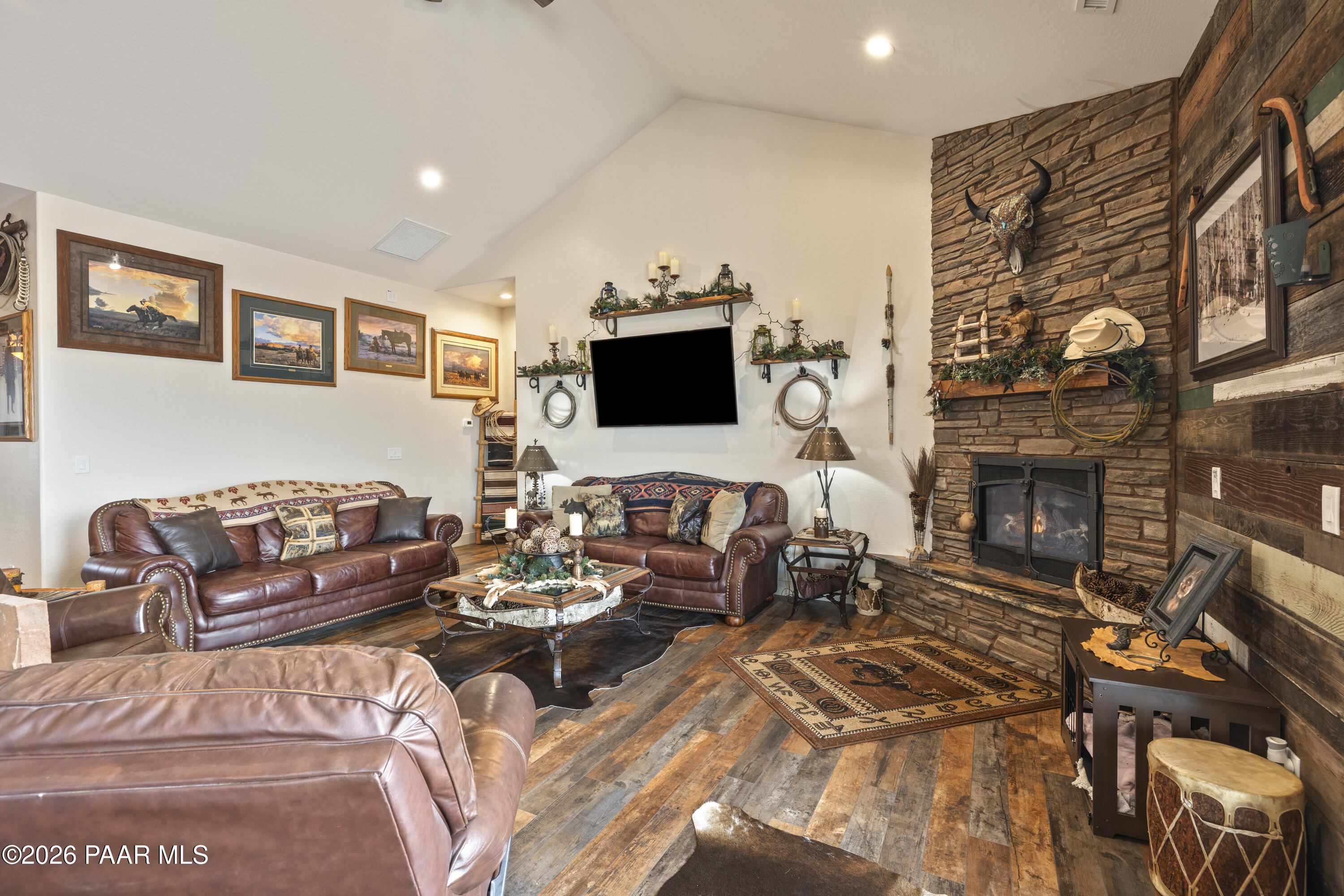 1399 East Western Way Paulden, AZ 86334 - Photo 8 of 44 a living room with furniture a fireplace and a flat screen tv
