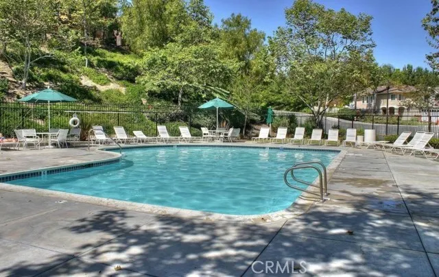 a view of a park with large trees