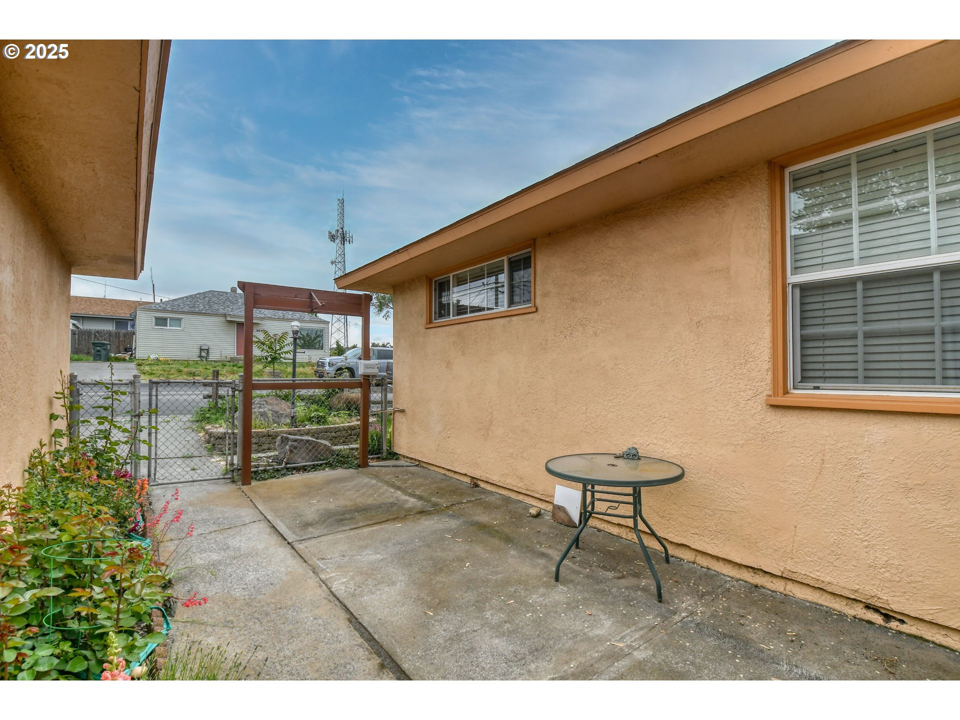 728 Southeast 6th Street Pendleton, OR 97801 - Photo 22 of 34 a view of a backyard with a chair and table