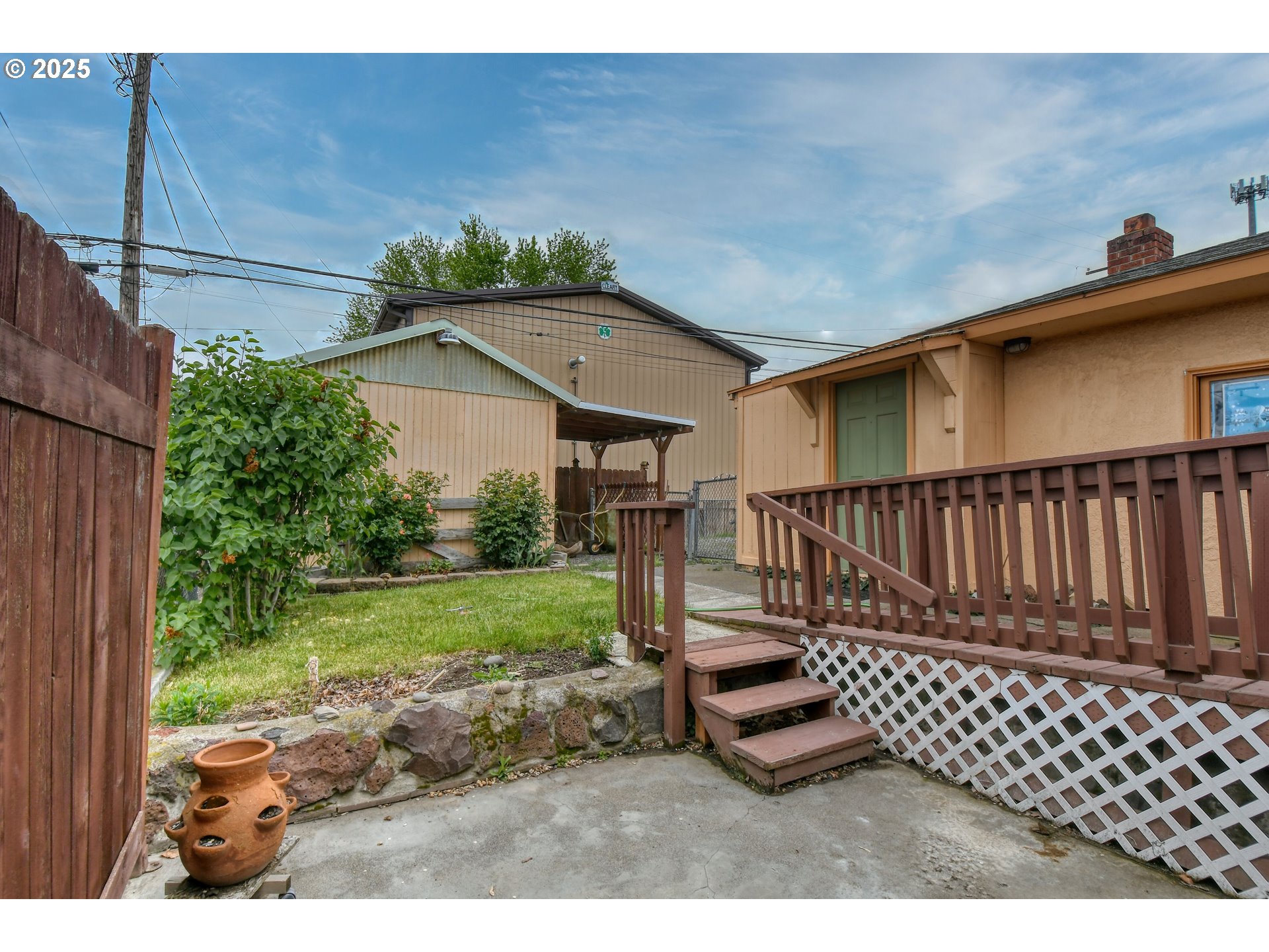 728 Southeast 6th Street Pendleton, OR 97801 - Photo 29 of 34 a view of a backyard with wooden fence