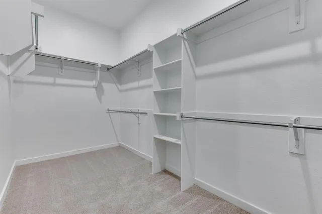 a view of an empty walk in closet