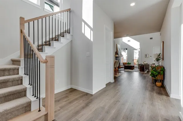 a view of a hallway view with staircase