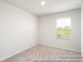9426 Apple Ridge Lane, Unit 303 San Antonio, TX 78239 - Photo 7 of 25 an empty room with a window