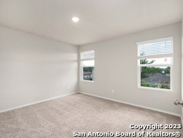 9426 Apple Ridge Lane, Unit 303 San Antonio, TX 78239 - Photo 10 of 25 an empty room with windows
