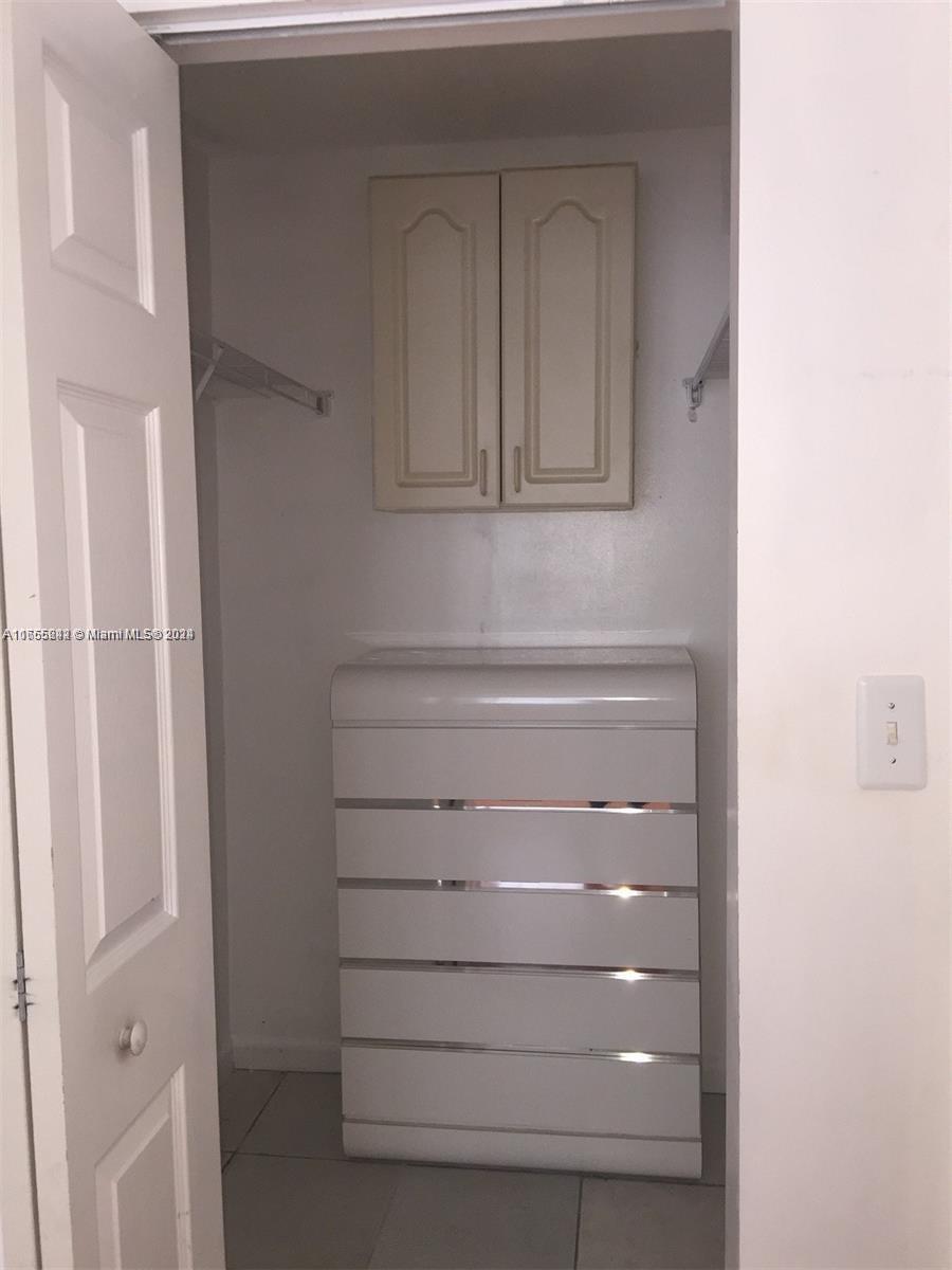 10057 Winding Lake Road, Unit 103 Sunrise, FL 33351 - Photo 10 of 13 a close view of closet