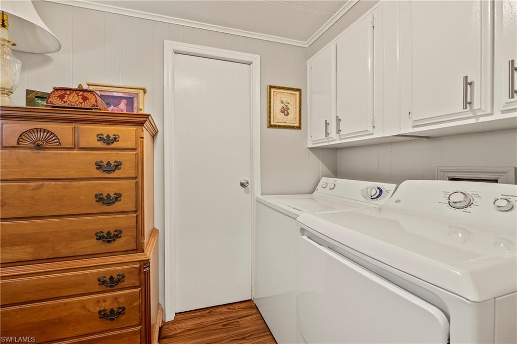 284 Cape Sable Drive Naples, FL 34104 - Photo 17 of 20 a utility room with dryer and washer