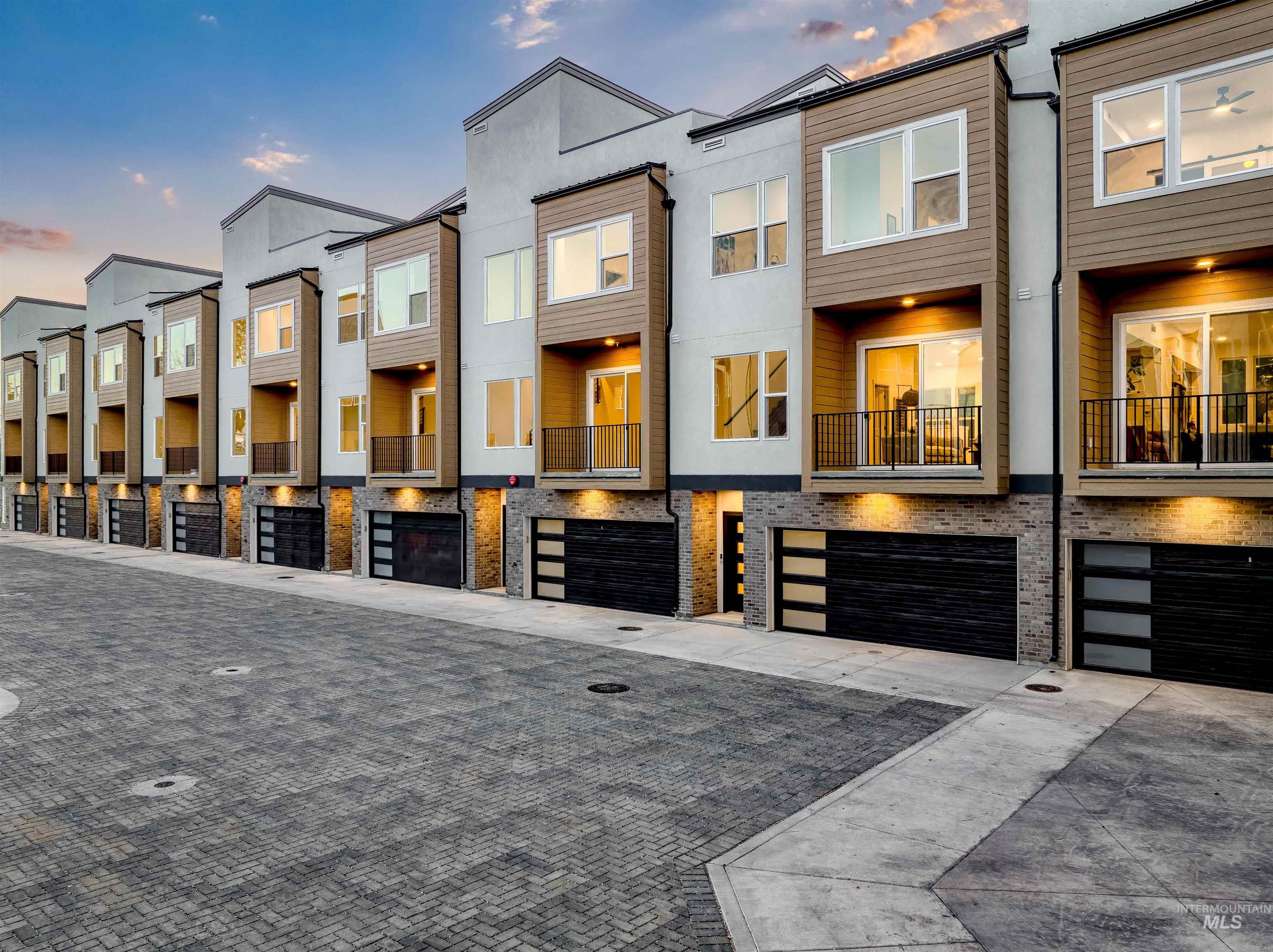2044 South Mackinnon Lane Boise, ID 83706 - Photo 3 of 48 View of front of property with an attached garage, driveway, and a residential view