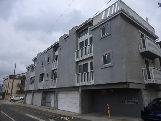 a view of a livingroom with furniture and a flat screen tv