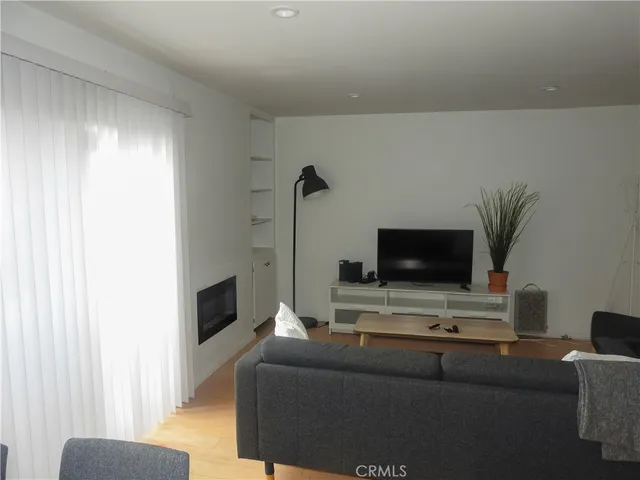 a view of a workspace with furniture