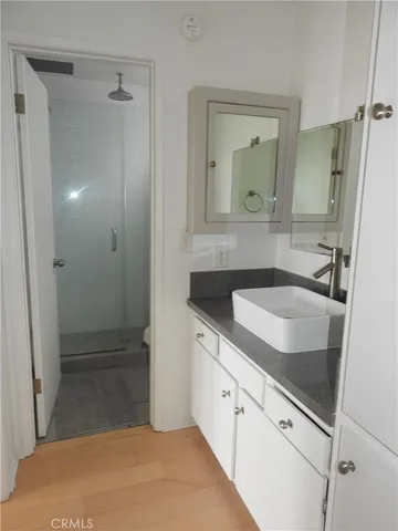 a living room with a couch and a flat screen tv