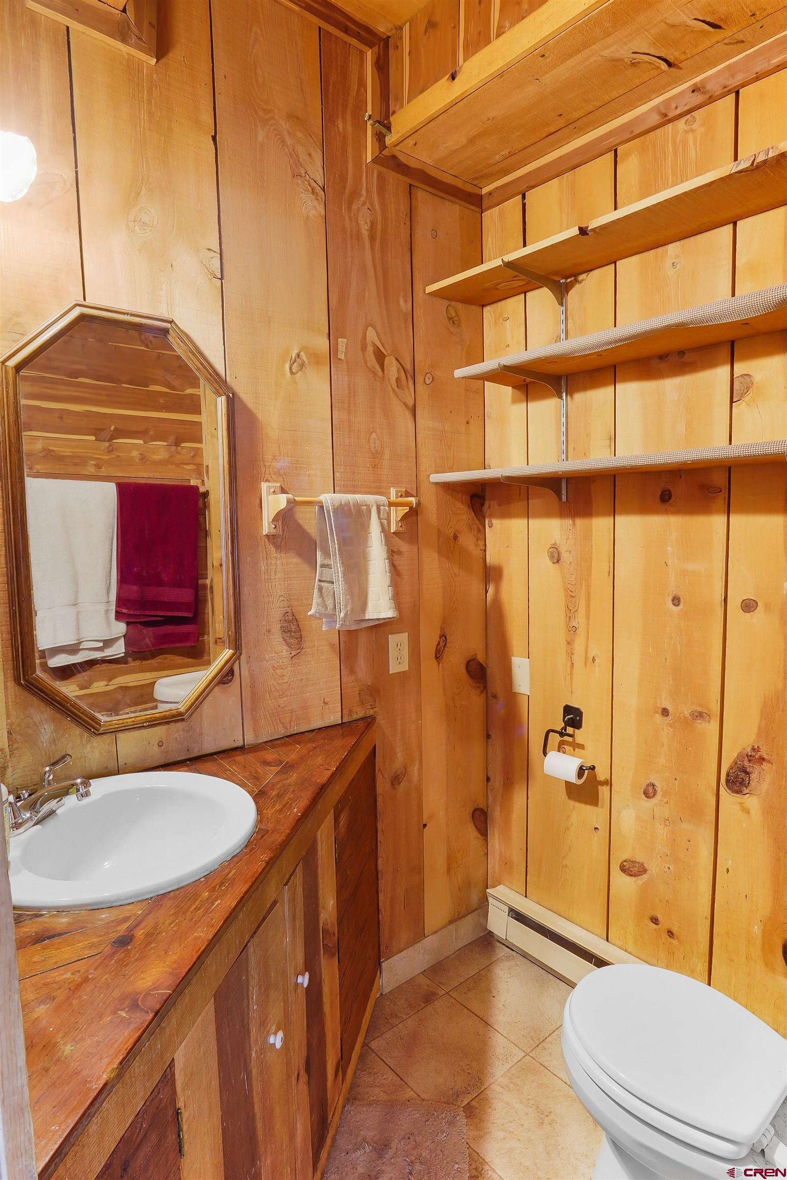 78 Groves Drive Durango, CO 81301 - Photo 11 of 35 a bathroom with a sink a toilet and shower