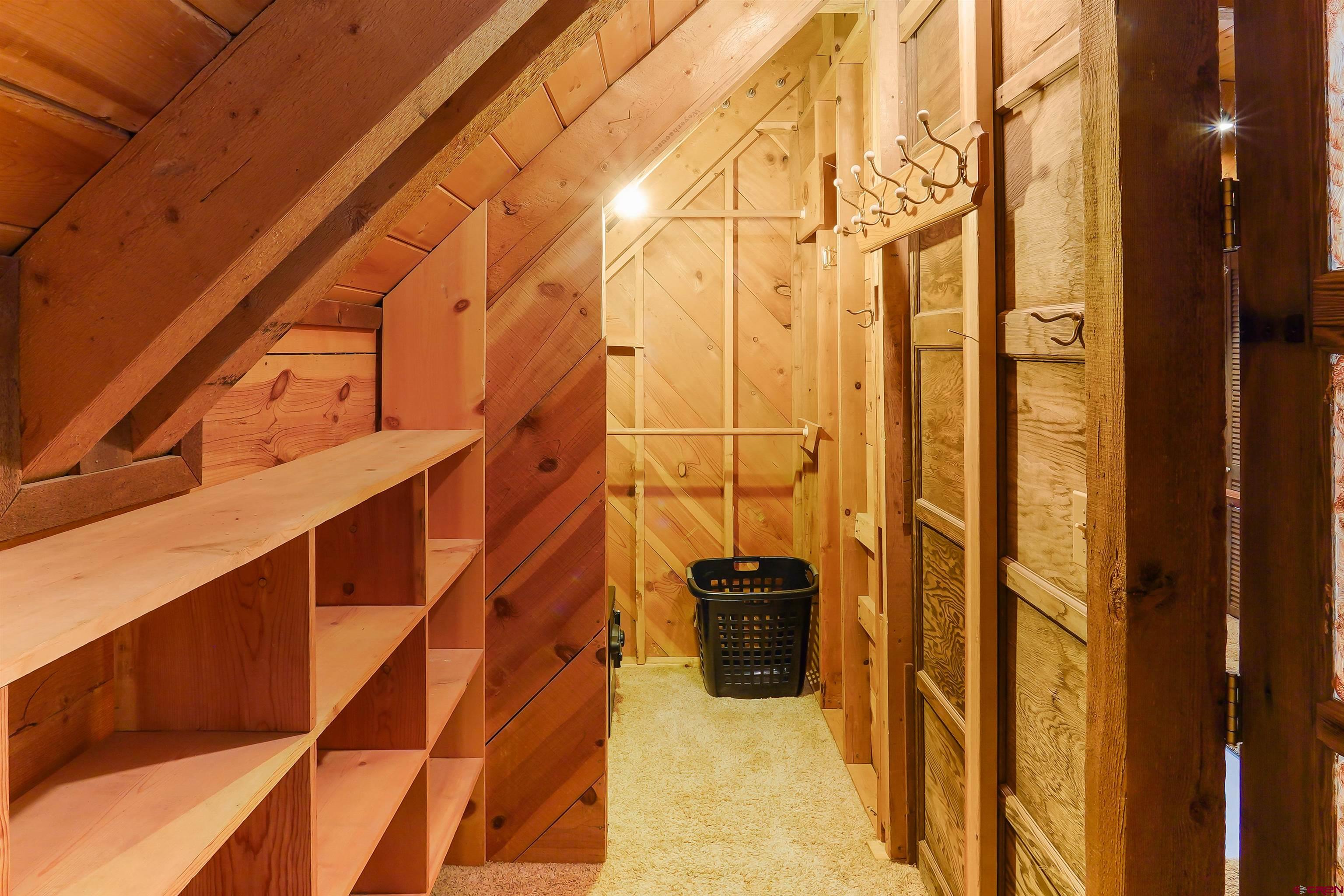 78 Groves Drive Durango, CO 81301 - Photo 22 of 35 a view of a balcony with wooden floor and walls