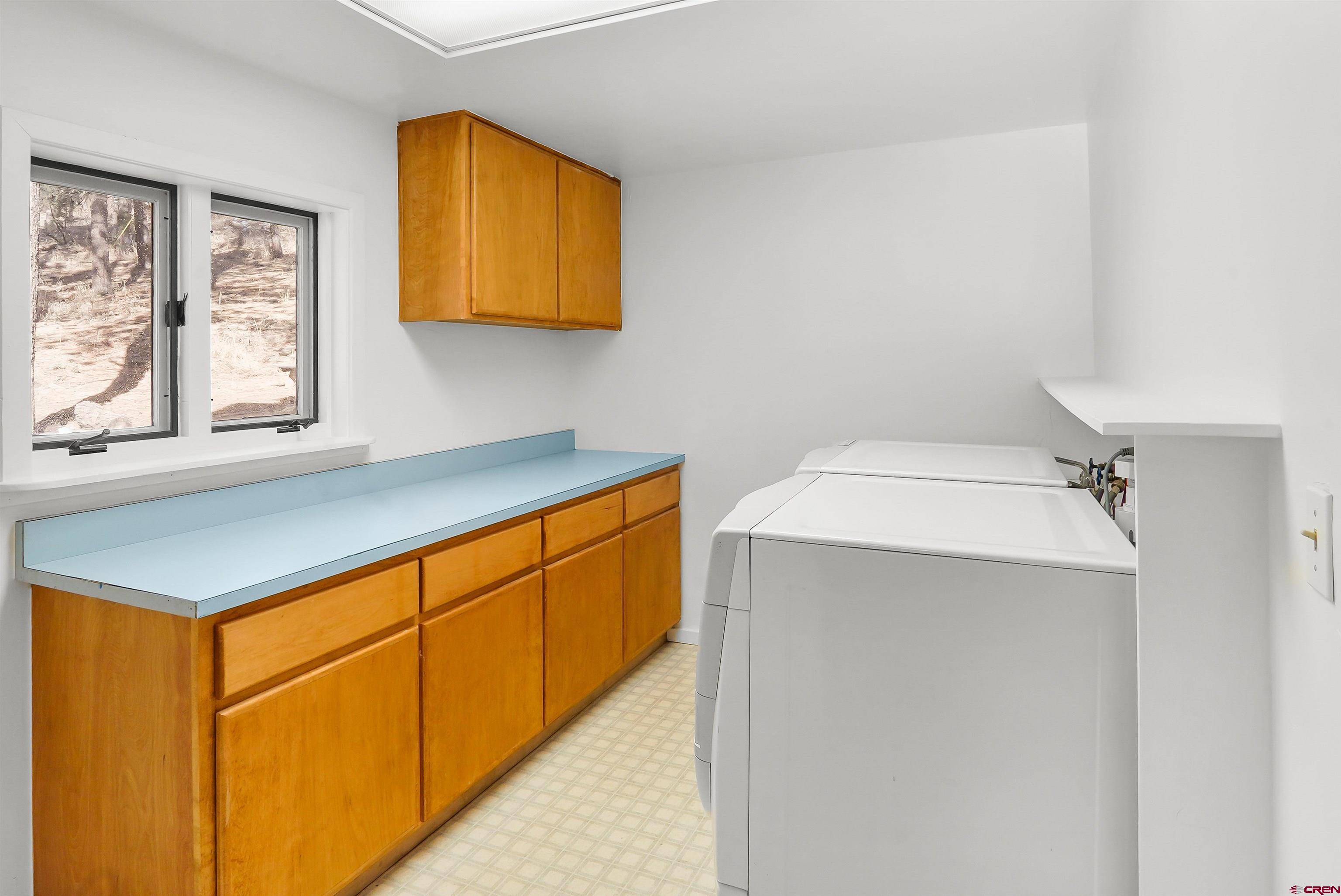 78 Groves Drive Durango, CO 81301 - Photo 27 of 35 a bathroom with a sink a mirror and a window