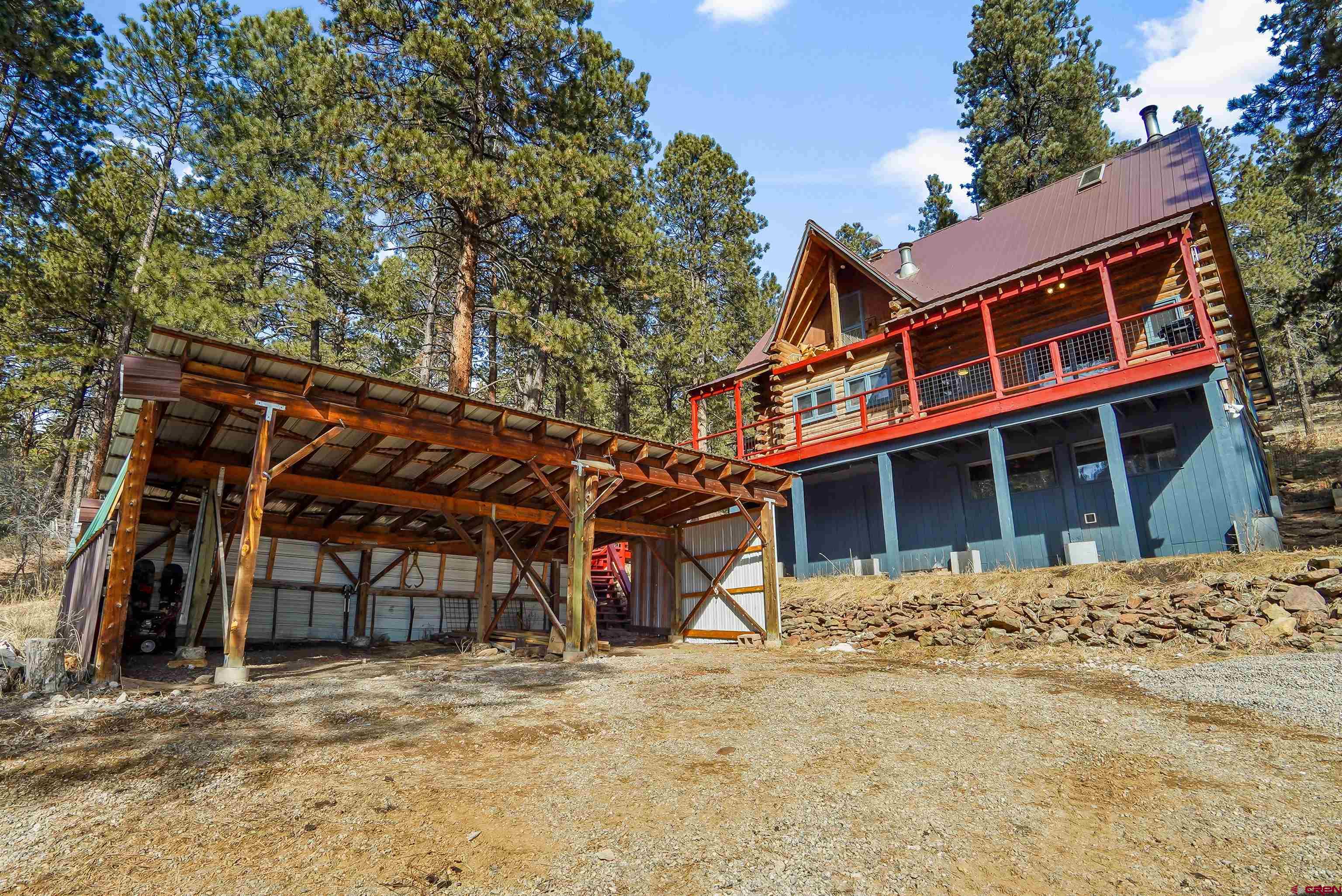 78 Groves Drive Durango, CO 81301 - Photo 31 of 35 a front view of a house with a snow