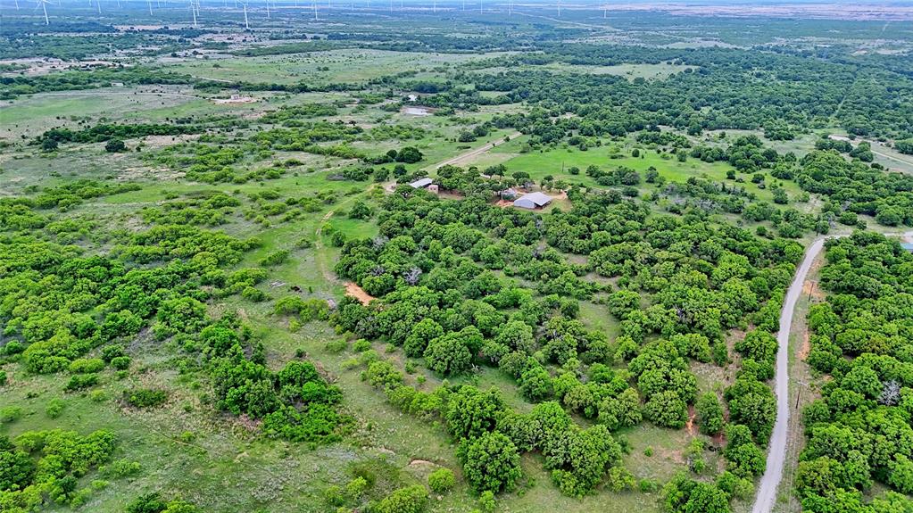 3377 Lodge Creek Road Henrietta, TX 76365 - Photo 4 of 40 a view of a lush green field