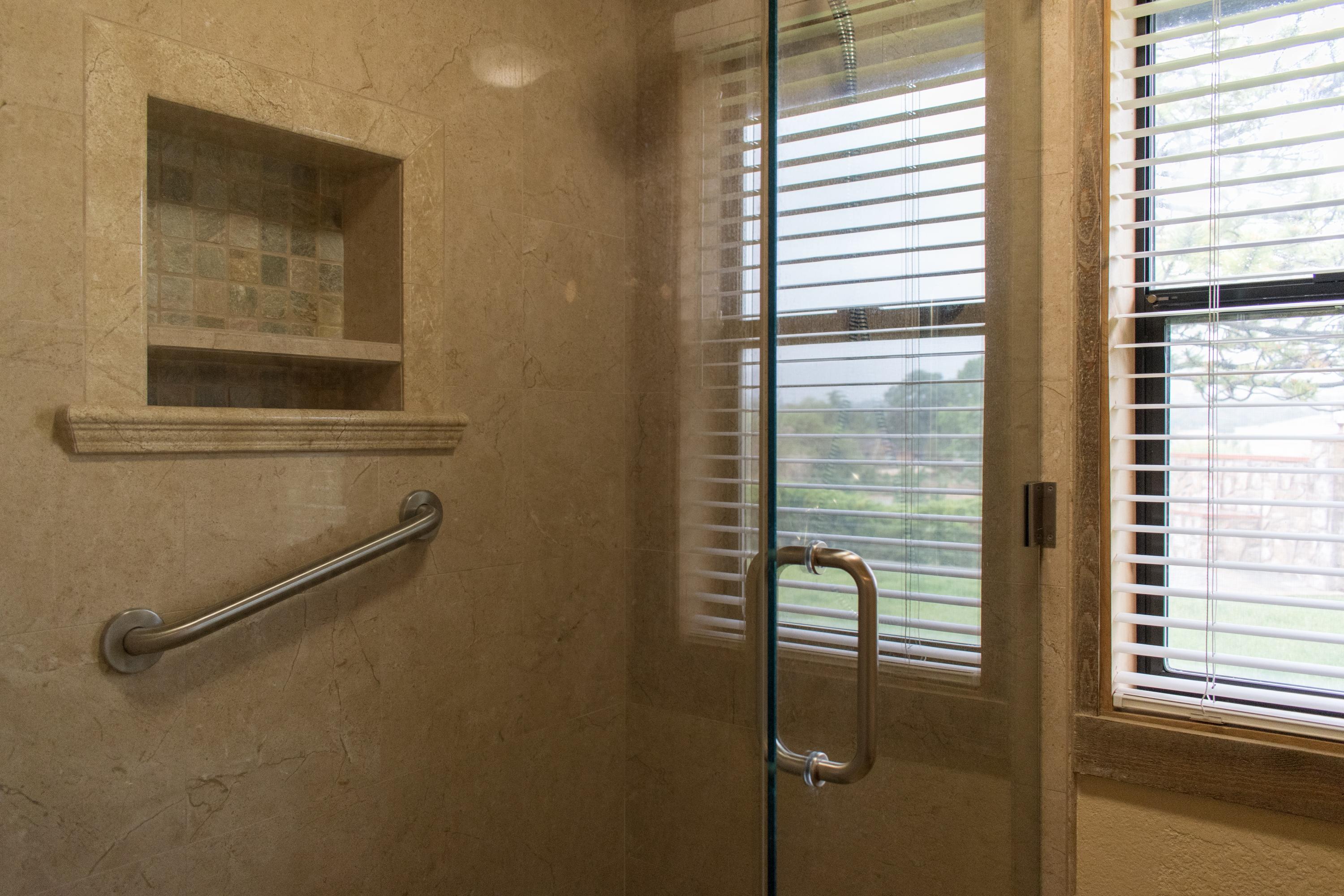 21175 Ridgeway Drive Tehachapi, CA 93561 - Photo 31 of 45 a bathroom with a shower