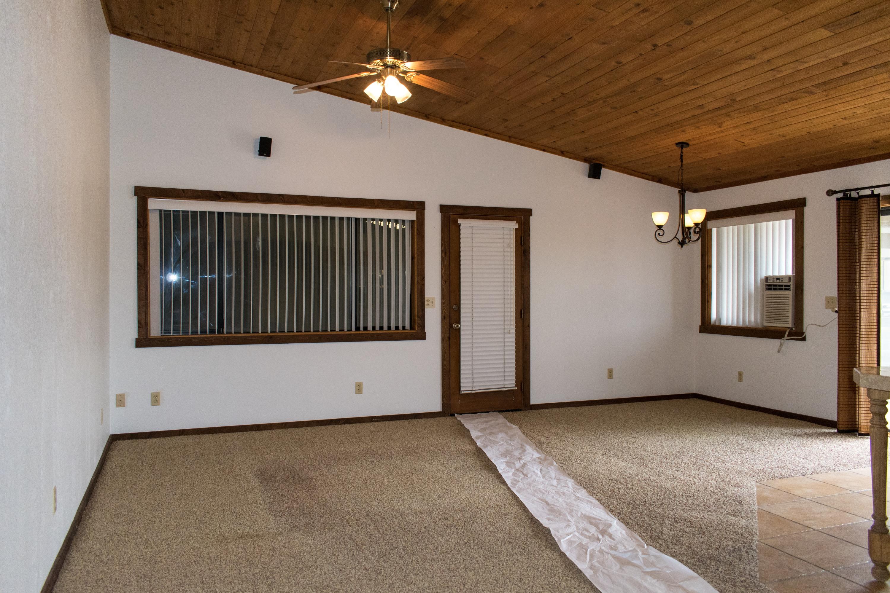 21175 Ridgeway Drive Tehachapi, CA 93561 - Photo 32 of 45 a view of an empty room with windows