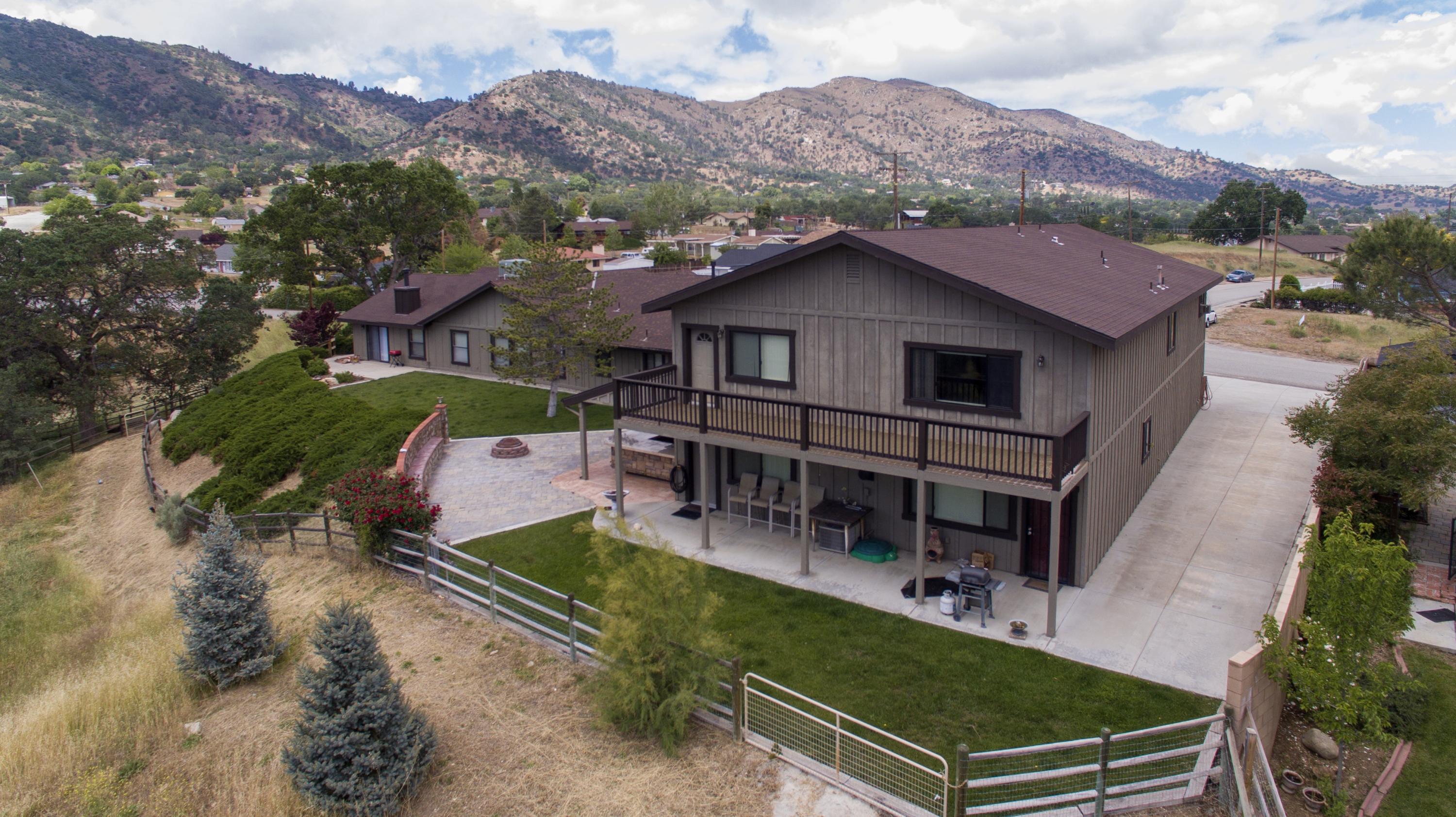21175 Ridgeway Drive Tehachapi, CA 93561 - Photo 7 of 45 an aerial view of a house with a garden