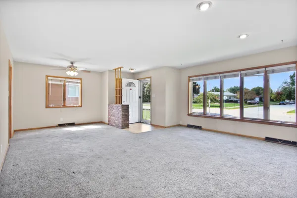 an empty room with windows