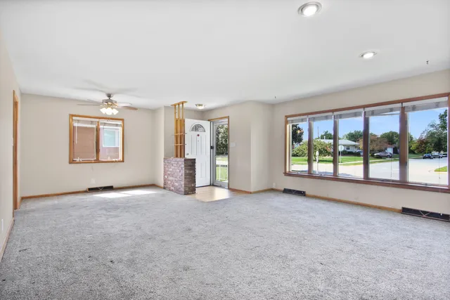 an empty room with windows