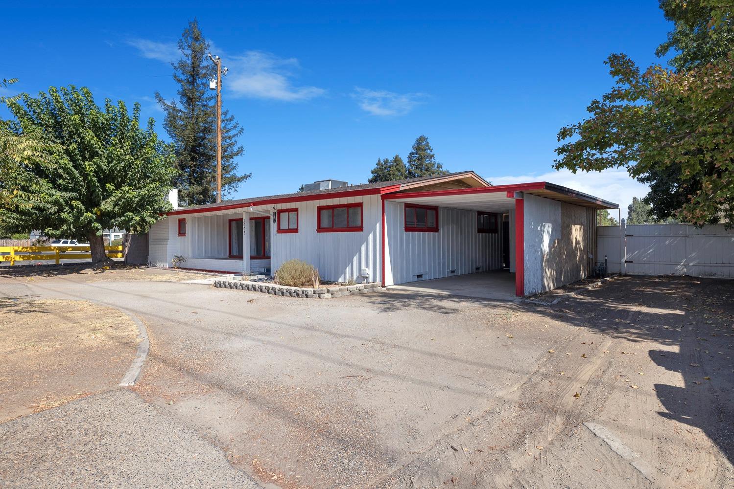 3009 Fowler Avenue Clovis, CA 93611 - Photo 2 of 34 a front view of a house with a yard