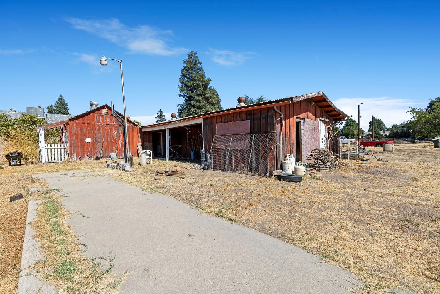 3009 Fowler Avenue Clovis, CA 93611 - Photo 30 of 34 a view of a house with a yard