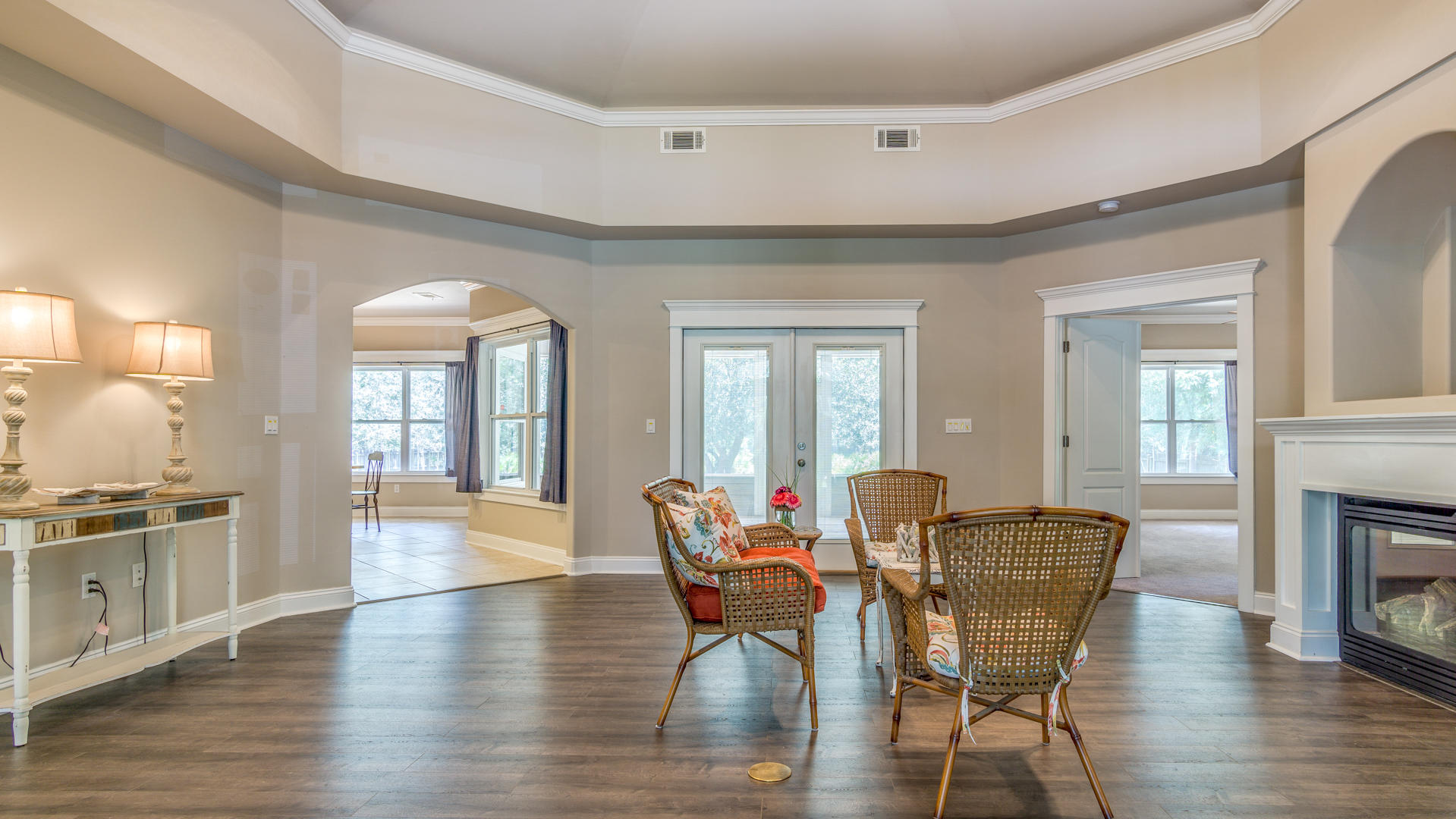 691 Mallet Bayou Road Freeport, FL 32439 - Photo 15 of 49 a dining room with furniture a fireplace and wooden floor