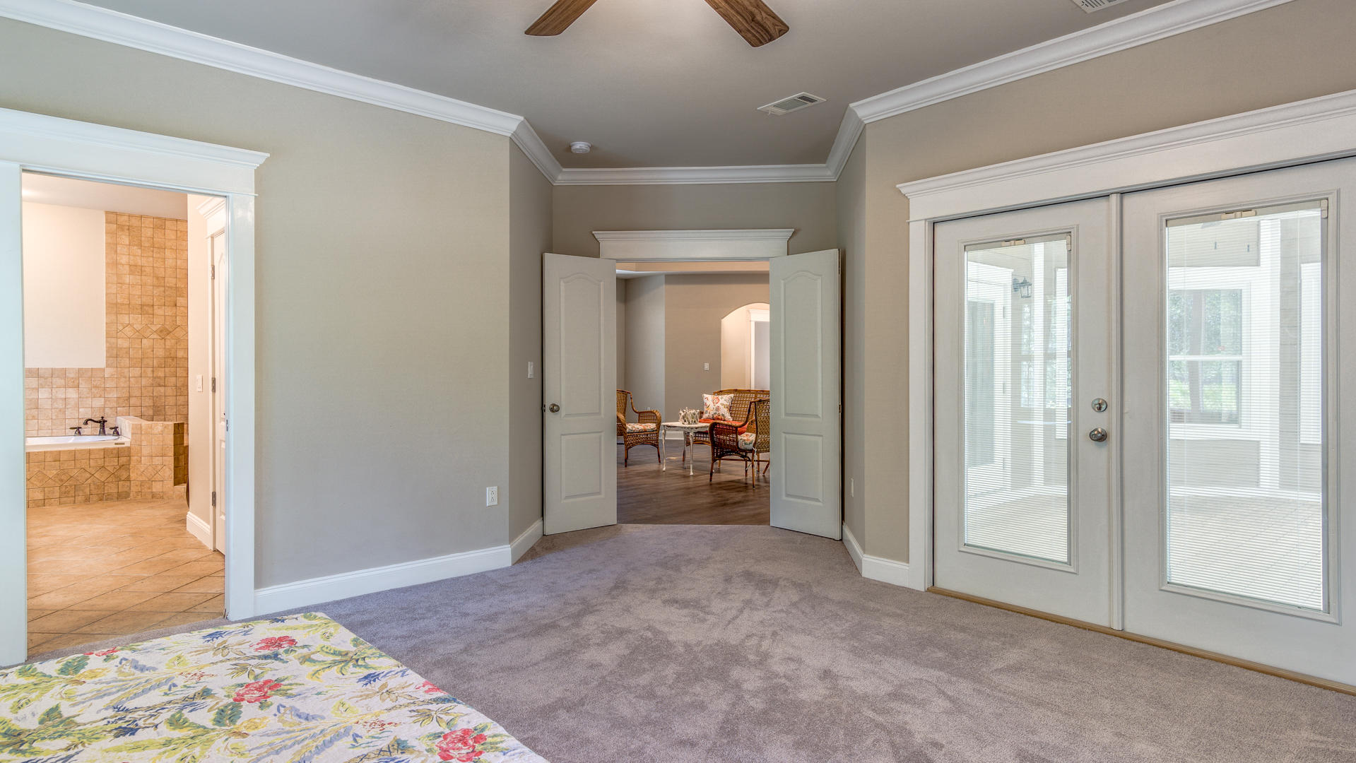 691 Mallet Bayou Road Freeport, FL 32439 - Photo 23 of 49 a view of a livingroom with wooden floor and a bedroom