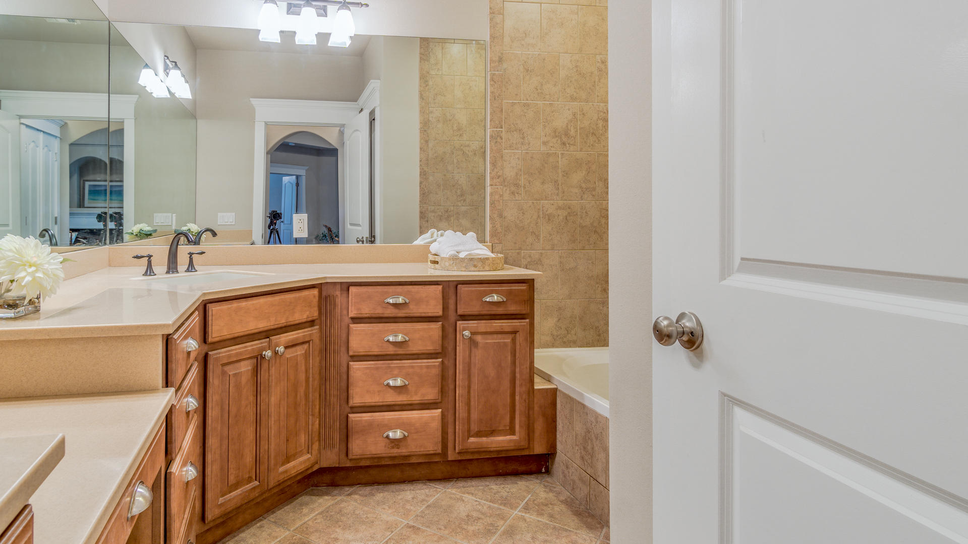 691 Mallet Bayou Road Freeport, FL 32439 - Photo 34 of 49 a spacious bathroom with a sink a vanity and a mirror