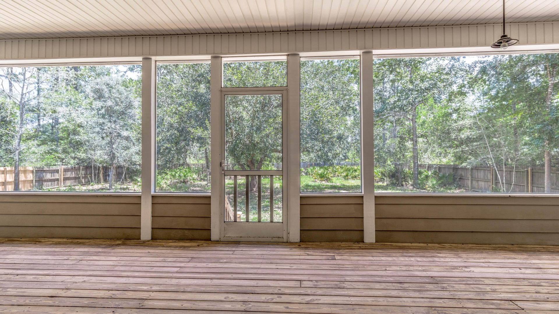 691 Mallet Bayou Road Freeport, FL 32439 - Photo 40 of 49 a view of a lot of windows in a room