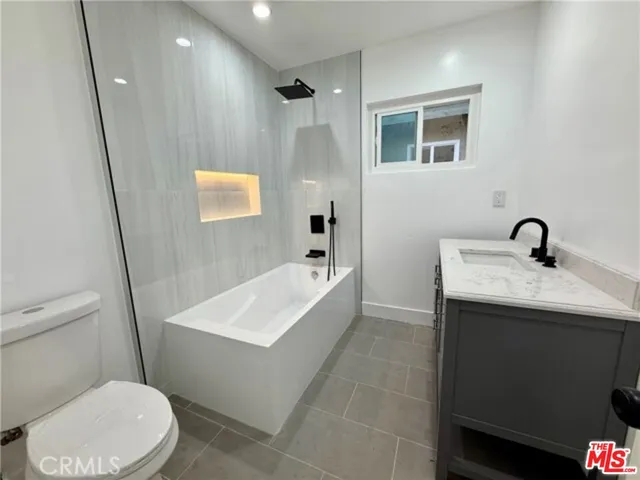 a bathroom with a sink and a tub