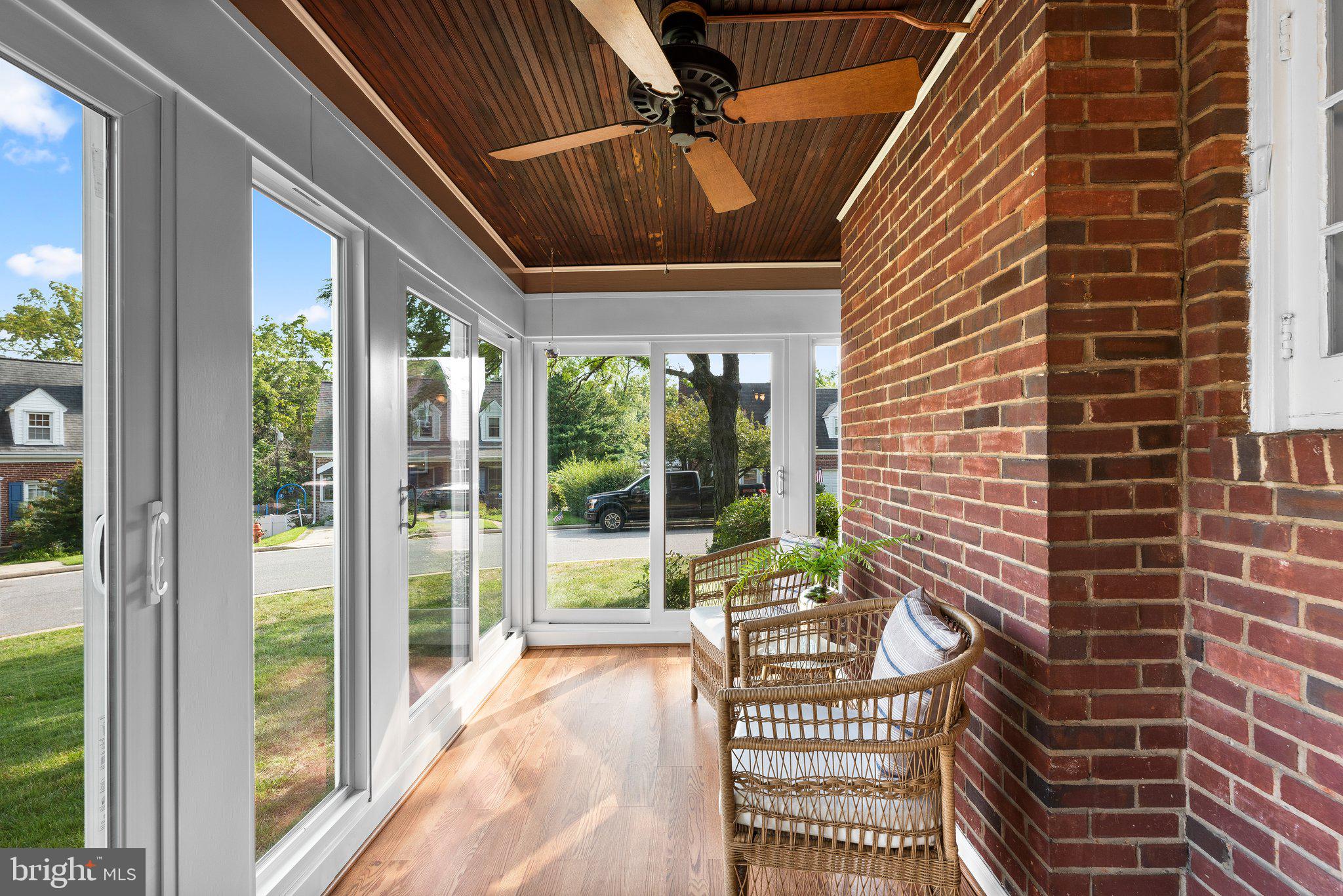 10 Tanglewood Road Catonsville, MD 21228 - Photo 16 of 48 Sunroom with wall-to-wall sliders