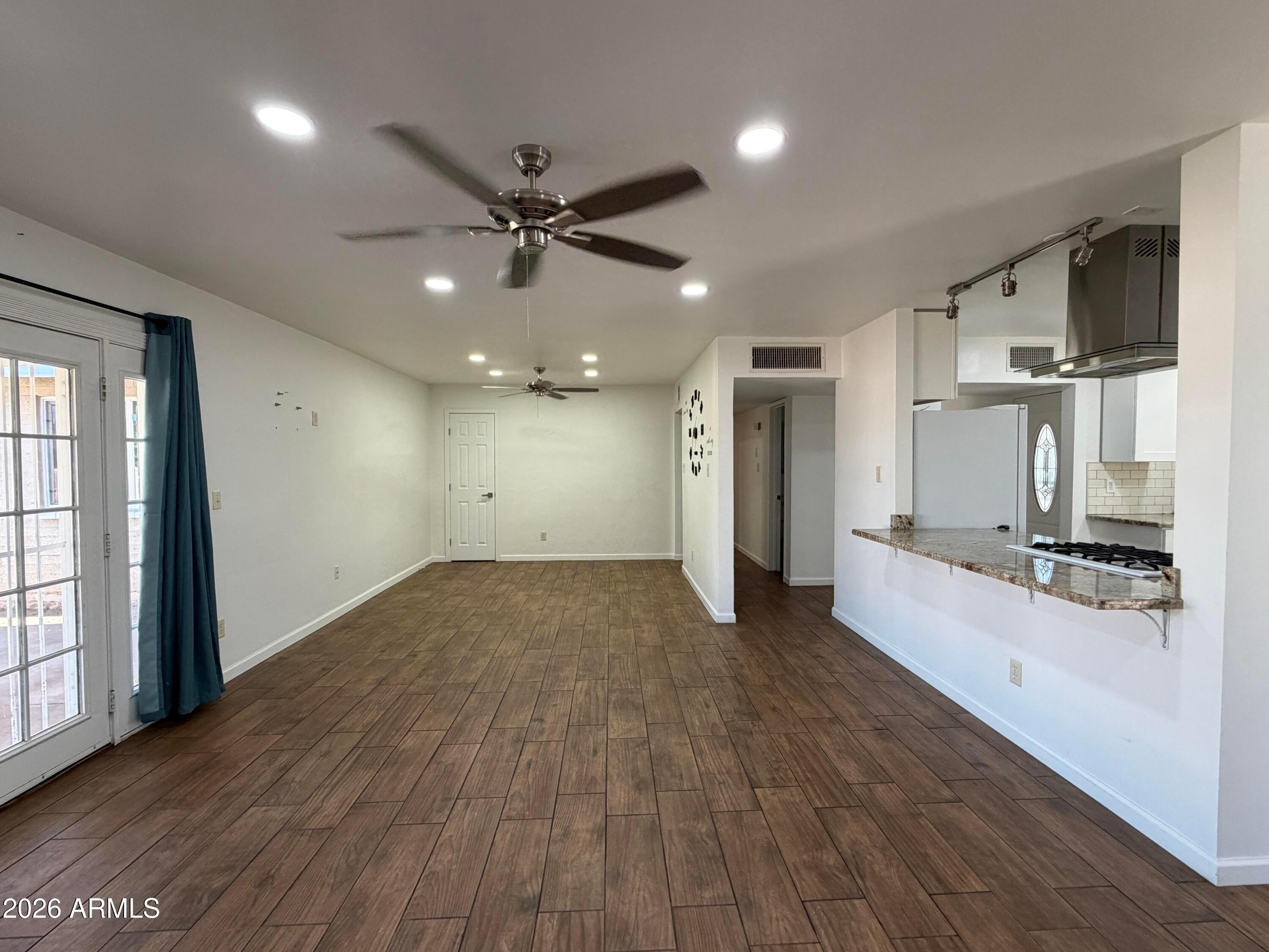 2 East Piedmont Road Phoenix, AZ 85042 - Photo 2 of 13 a view of a kitchen with a sink and a large window
