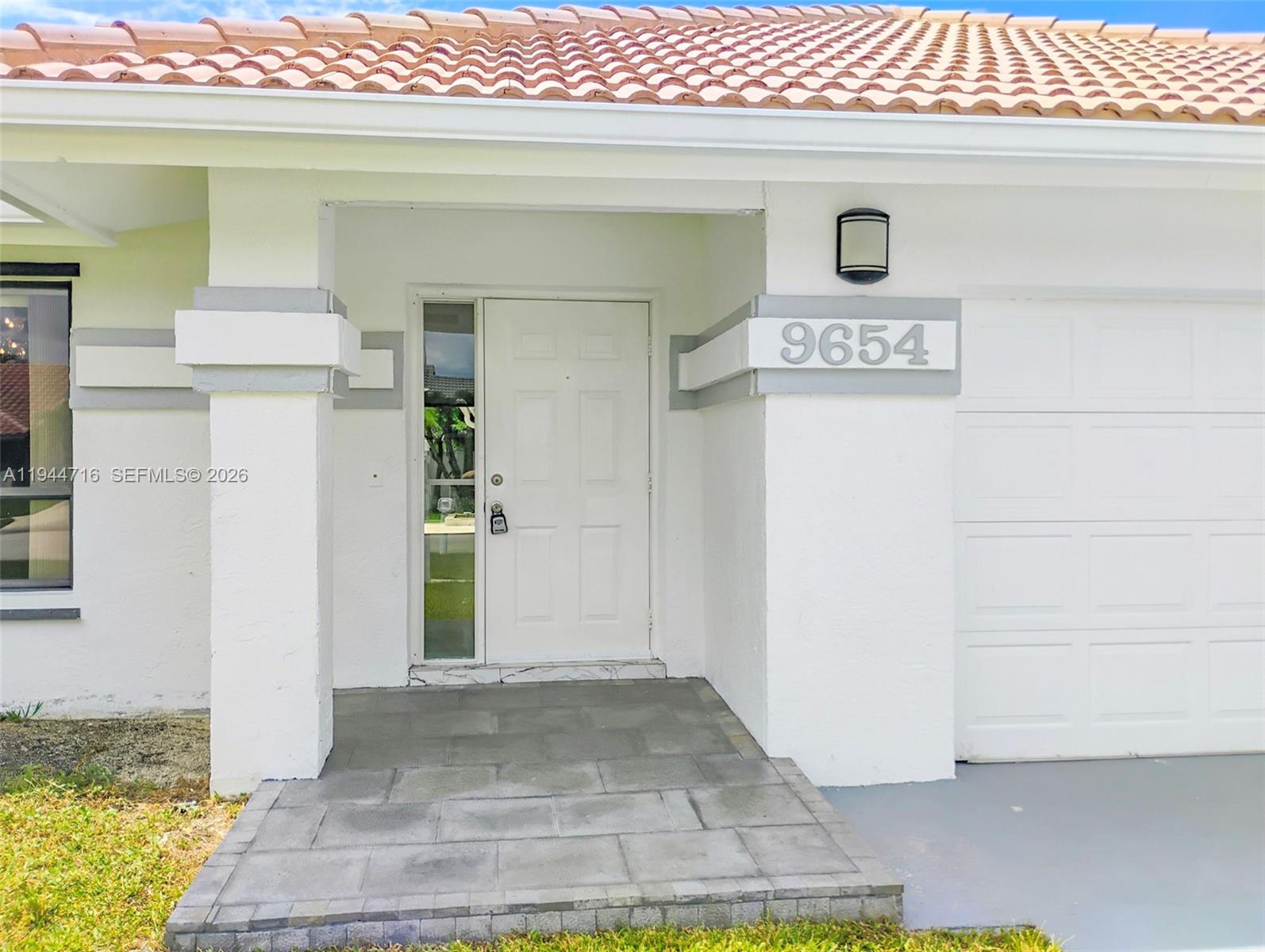 9654 Sun Pointe Drive Boynton Beach, FL 33437 - Photo 47 of 52 a view of a door