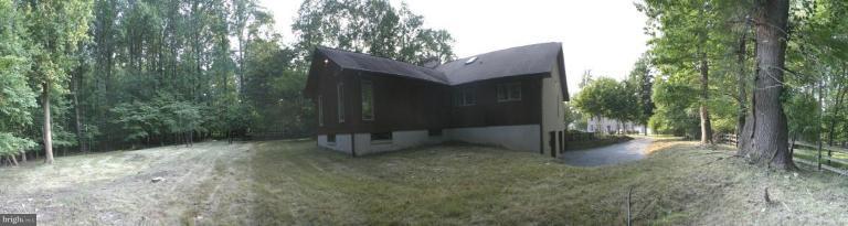 1400 Woodwell Road Silver Spring, MD 20906 - Photo 2 of 20 a view of a house with a tree