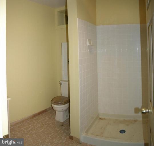 1400 Woodwell Road Silver Spring, MD 20906 - Photo 14 of 20 a bathroom with a shower and a toilet